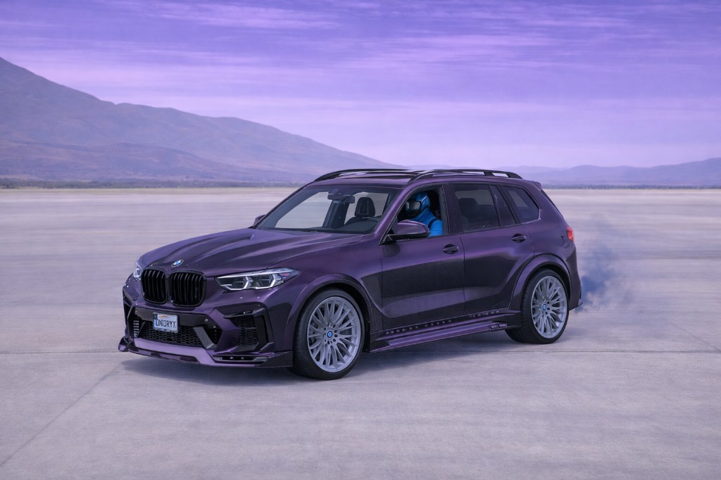 2NCSX7 — purple BMW X5 style SUV