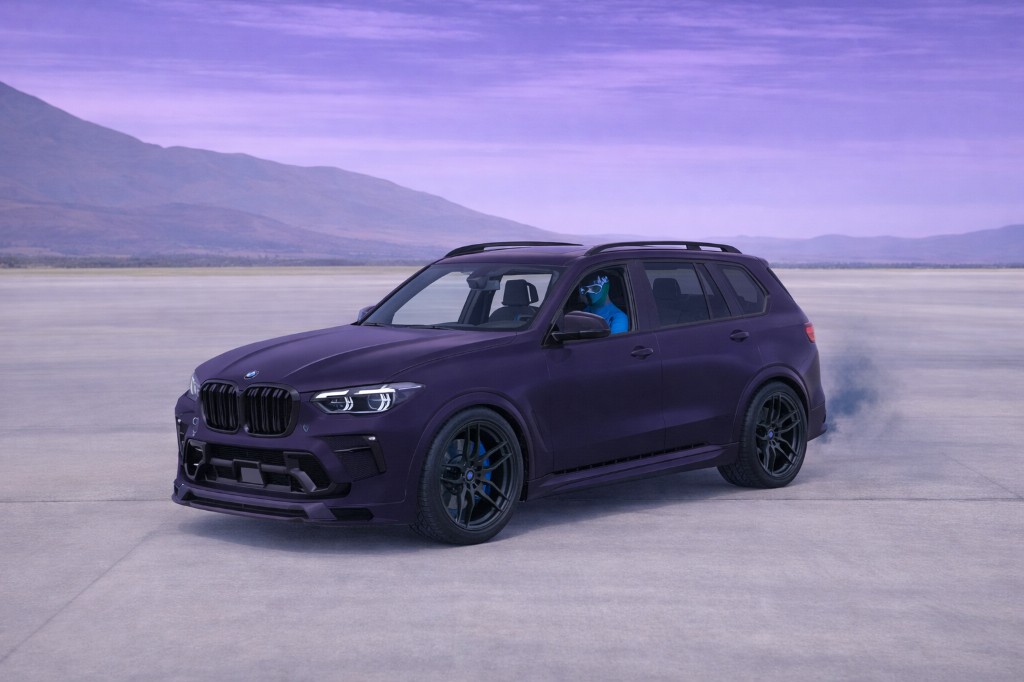 GCB23X7 — purple BMW X7 style SUV